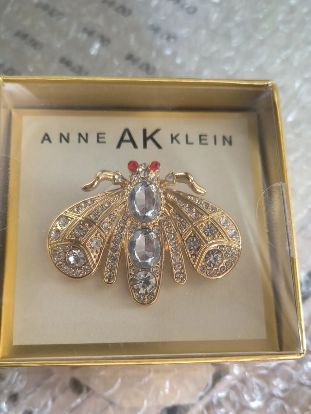 Anne Klein Gold Tone Crystal Bee Brooch with Red Accent